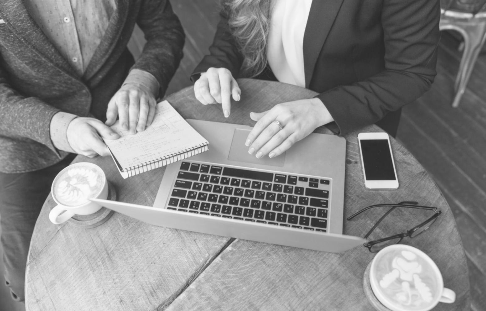 Students working together on financial analysis and reporting exercises during a workshop session